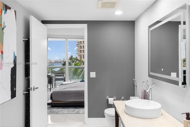 a swimming pool with outdoor seating and a outdoor view