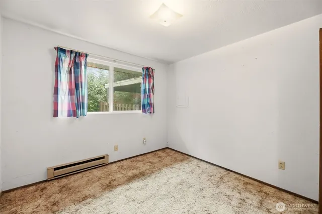 a view of a room with a window