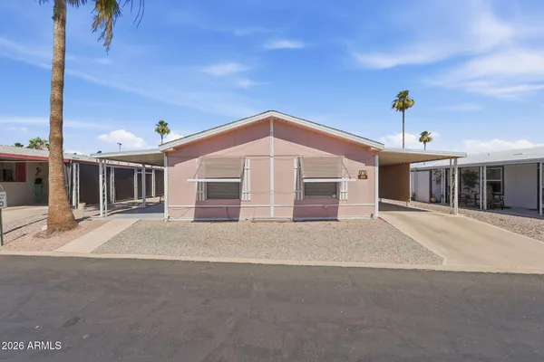 a front view of a house with a garage