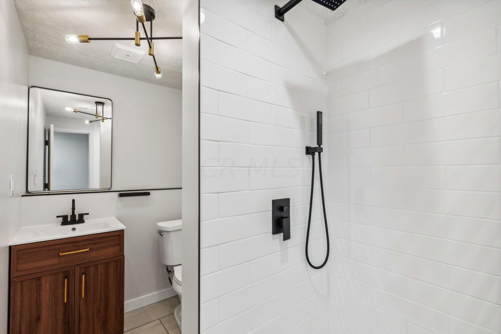 5421 Refugee Road Columbus, OH 43232 - Photo 13 of 17 UNWIND in this lower level bath/spa area!