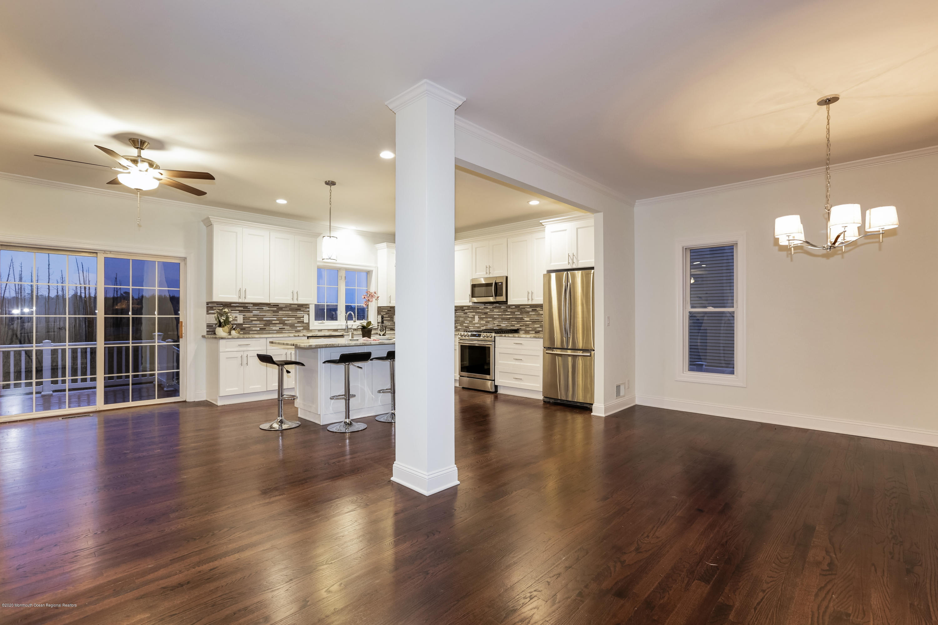 153 Royal Drive Brick, NJ 08723 - Photo 14 of 32 a view of a kitchen with furniture and wooden floor