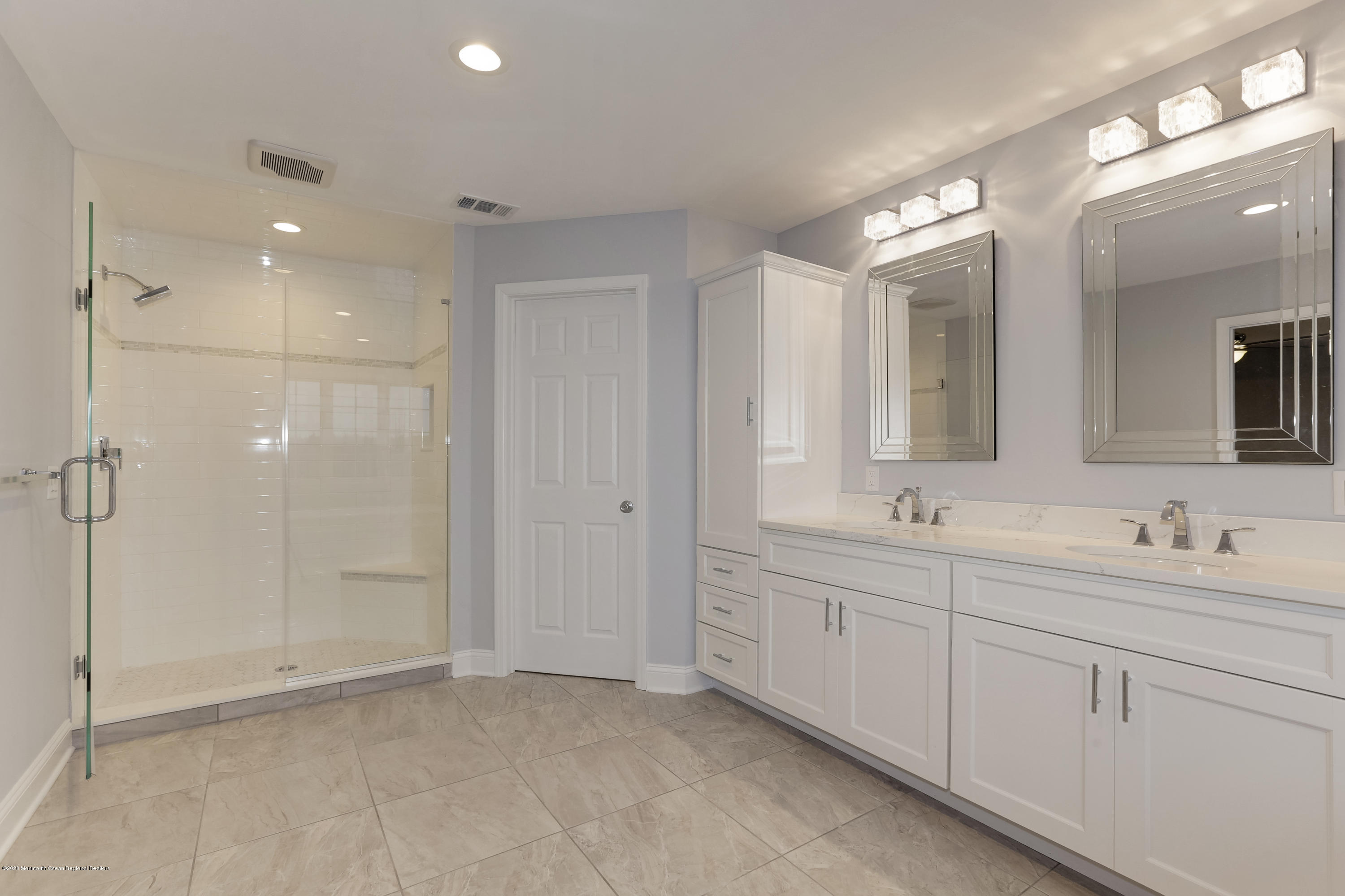 153 Royal Drive Brick, NJ 08723 - Photo 24 of 32 a bathroom with a double vanity sink mirror and shower