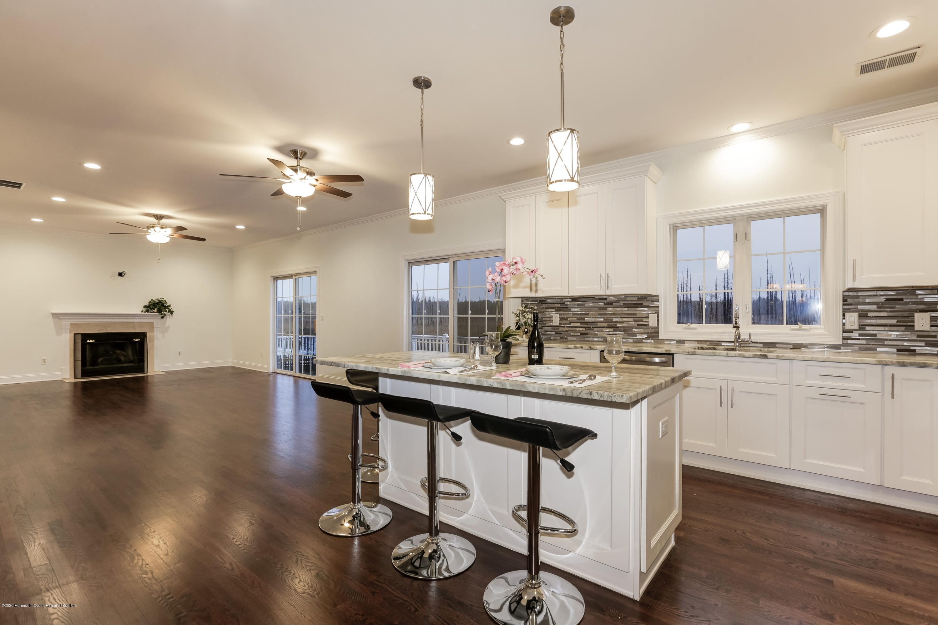 153 Royal Drive Brick, NJ 08723 - Photo 3 of 32 a kitchen with kitchen island a island in it