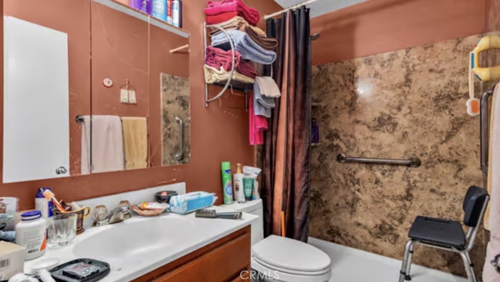 52117 Genoa Street Coachella, CA 92236 - Photo 17 of 35 a bathroom with a sink toilet and shower