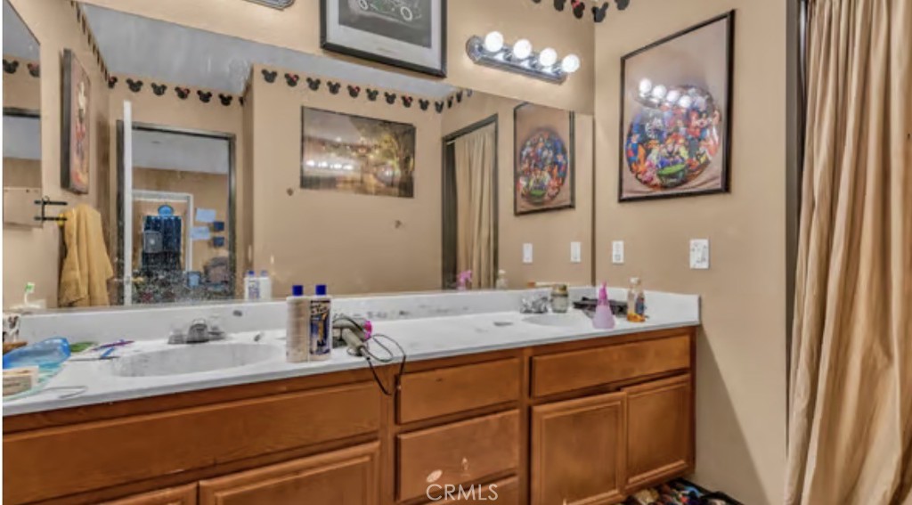 52117 Genoa Street Coachella, CA 92236 - Photo 27 of 35 a bathroom with a sink and a mirror