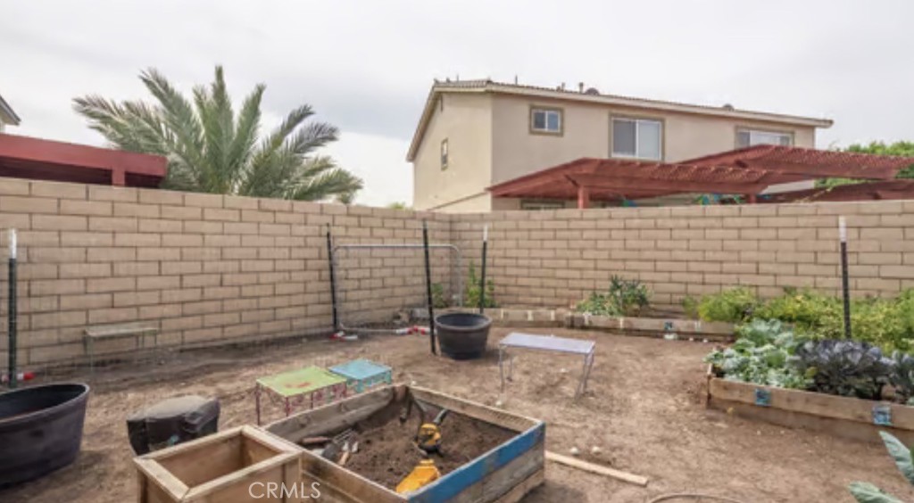 52117 Genoa Street Coachella, CA 92236 - Photo 33 of 35 a view of a backyard with sitting area