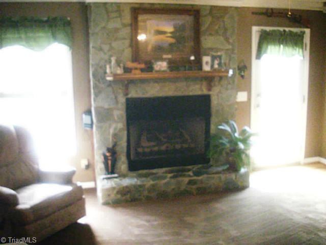 1363 Cortez Road Asheboro, NC 27205 - Photo 4 of 16 Living Room. Rock fireplace
