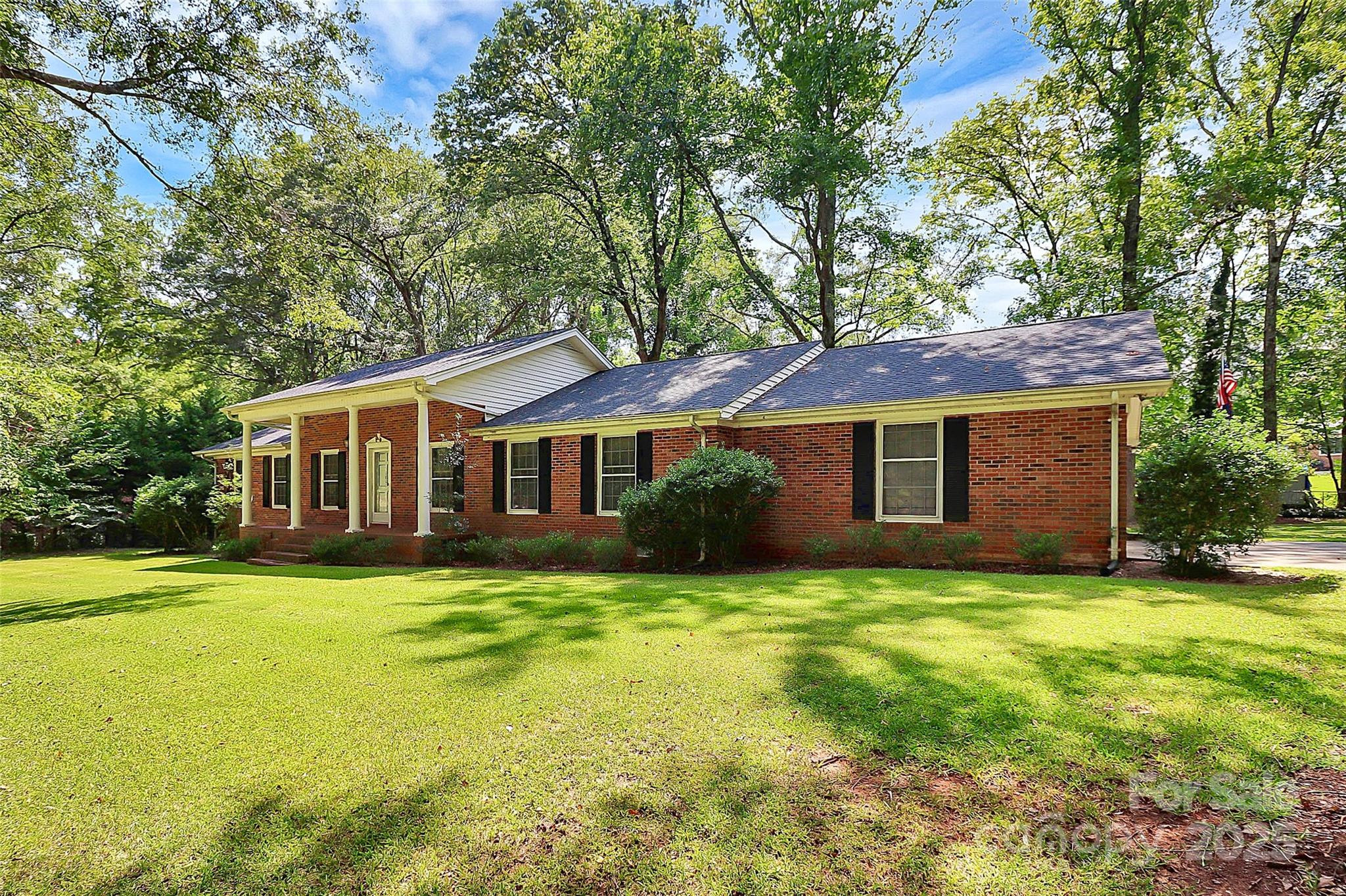 1801 Windsor Drive Lancaster, SC 29720 - Photo 18 of 28 a front view of a house with yard and green space
