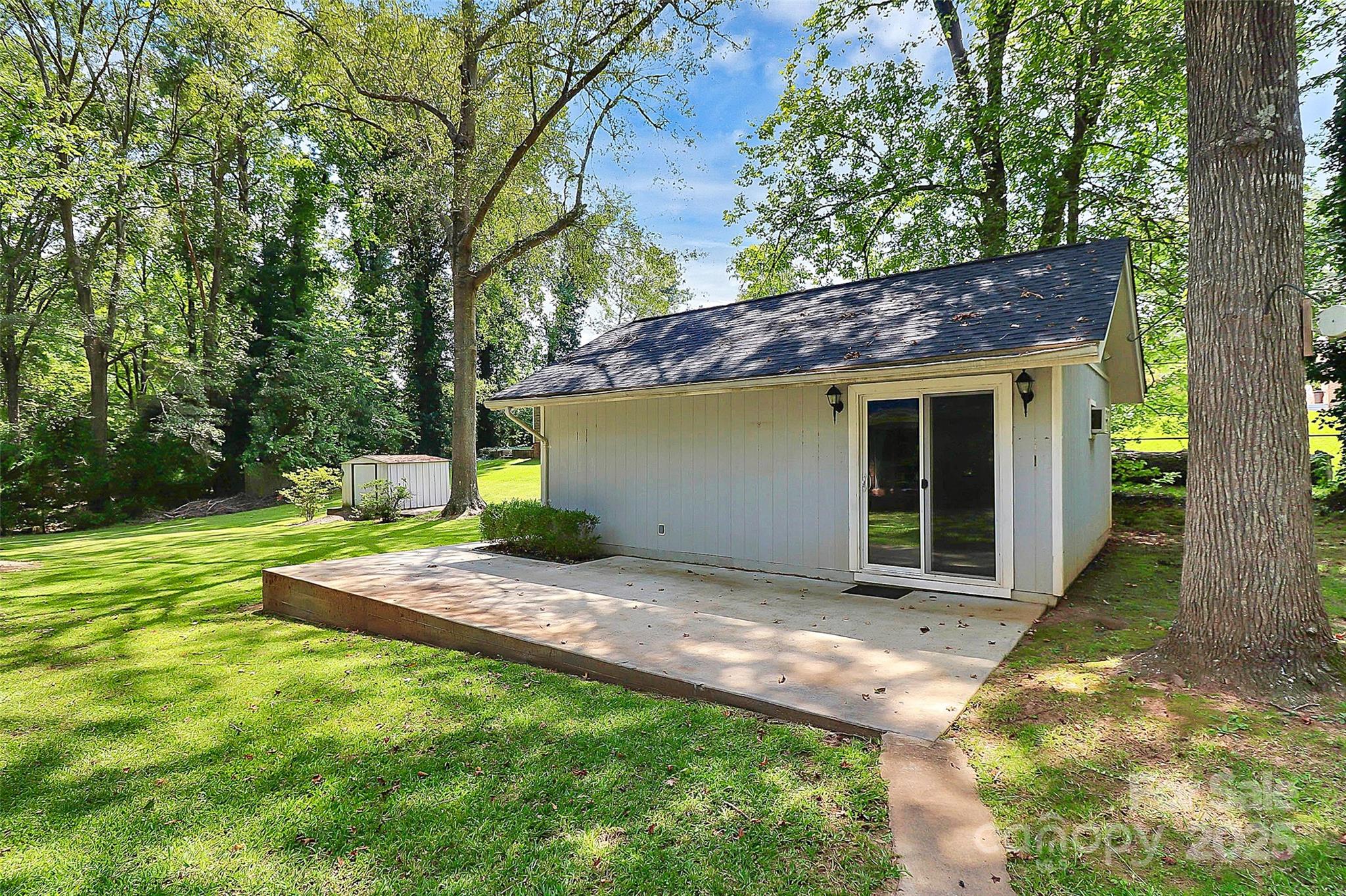 1801 Windsor Drive Lancaster, SC 29720 - Photo 2 of 28 a view of a house with backyard and a tree
