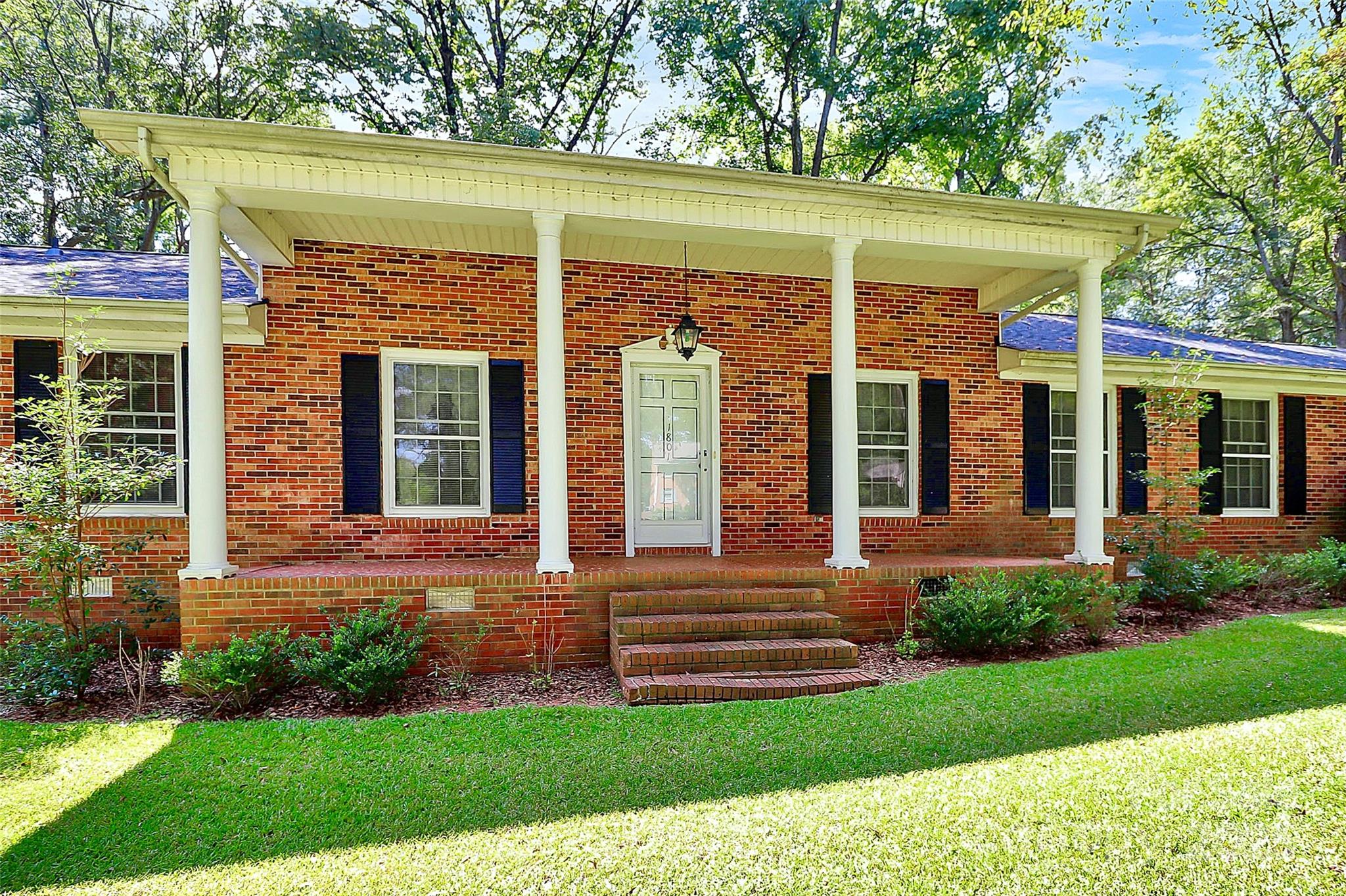 1801 Windsor Drive Lancaster, SC 29720 - Photo 24 of 28 front view of a house with a yard