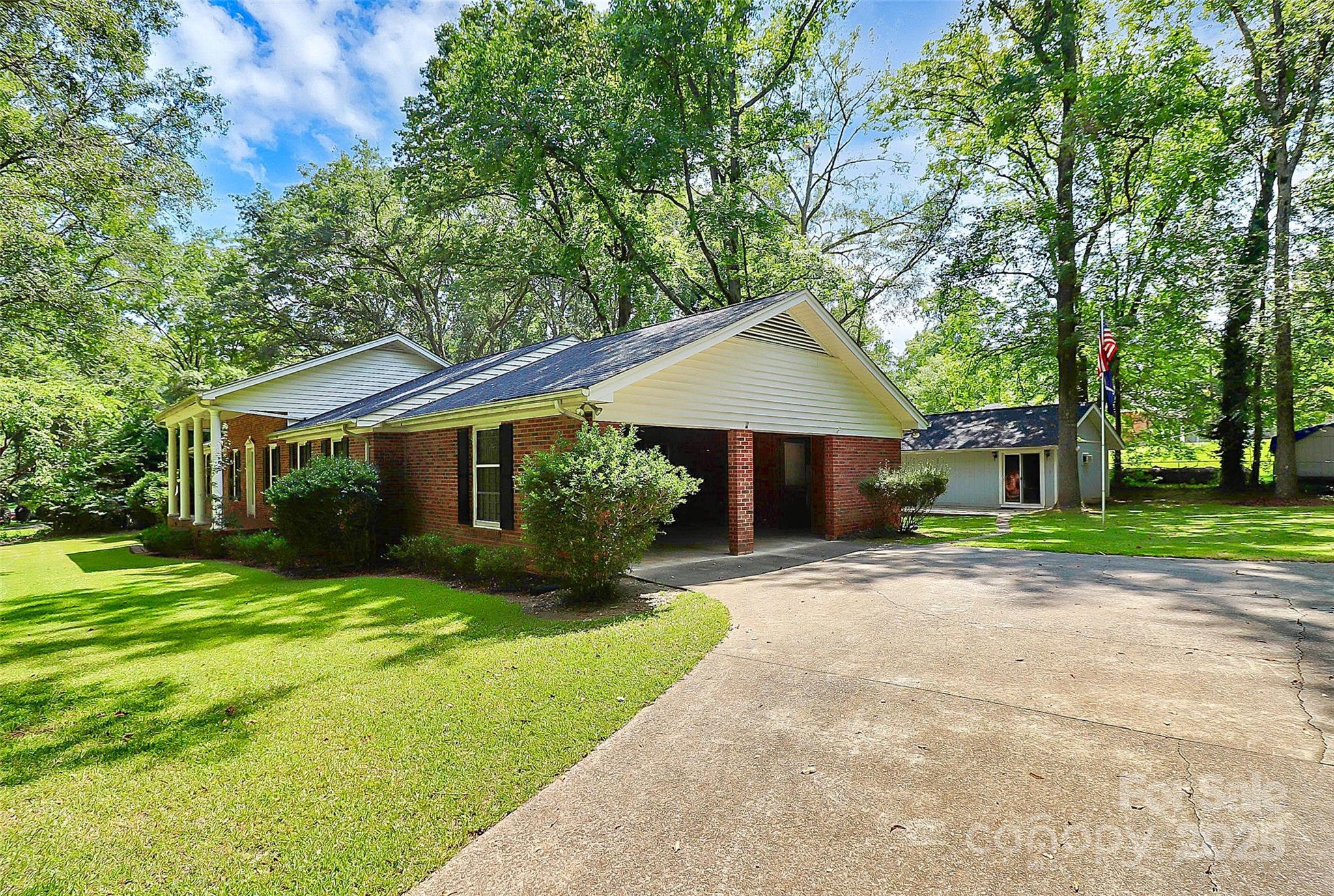 1801 Windsor Drive Lancaster, SC 29720 - Photo 27 of 28 a front view of a house with a yard and garage