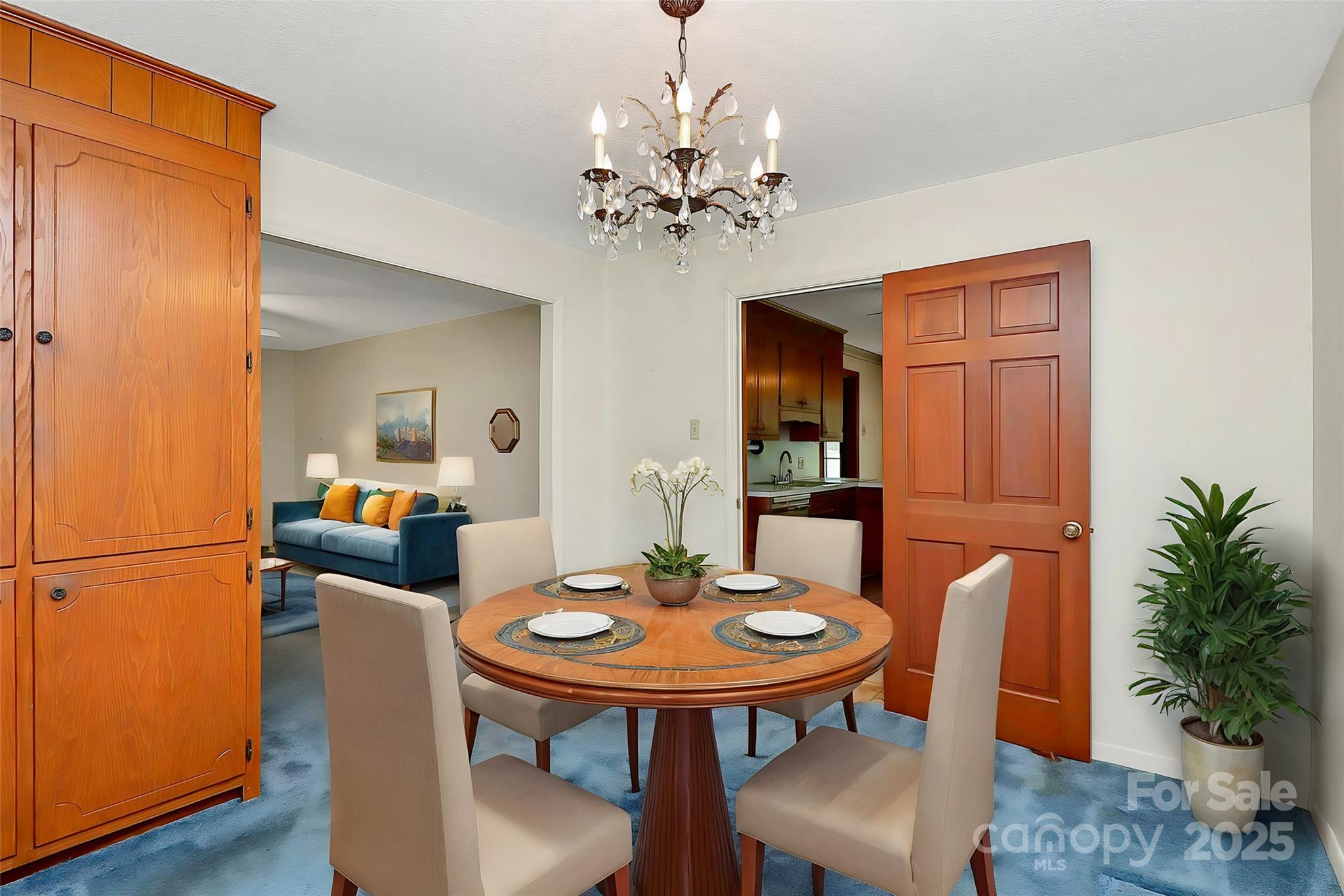 1801 Windsor Drive Lancaster, SC 29720 - Photo 7 of 28 a view of a dining room with furniture and chandelier