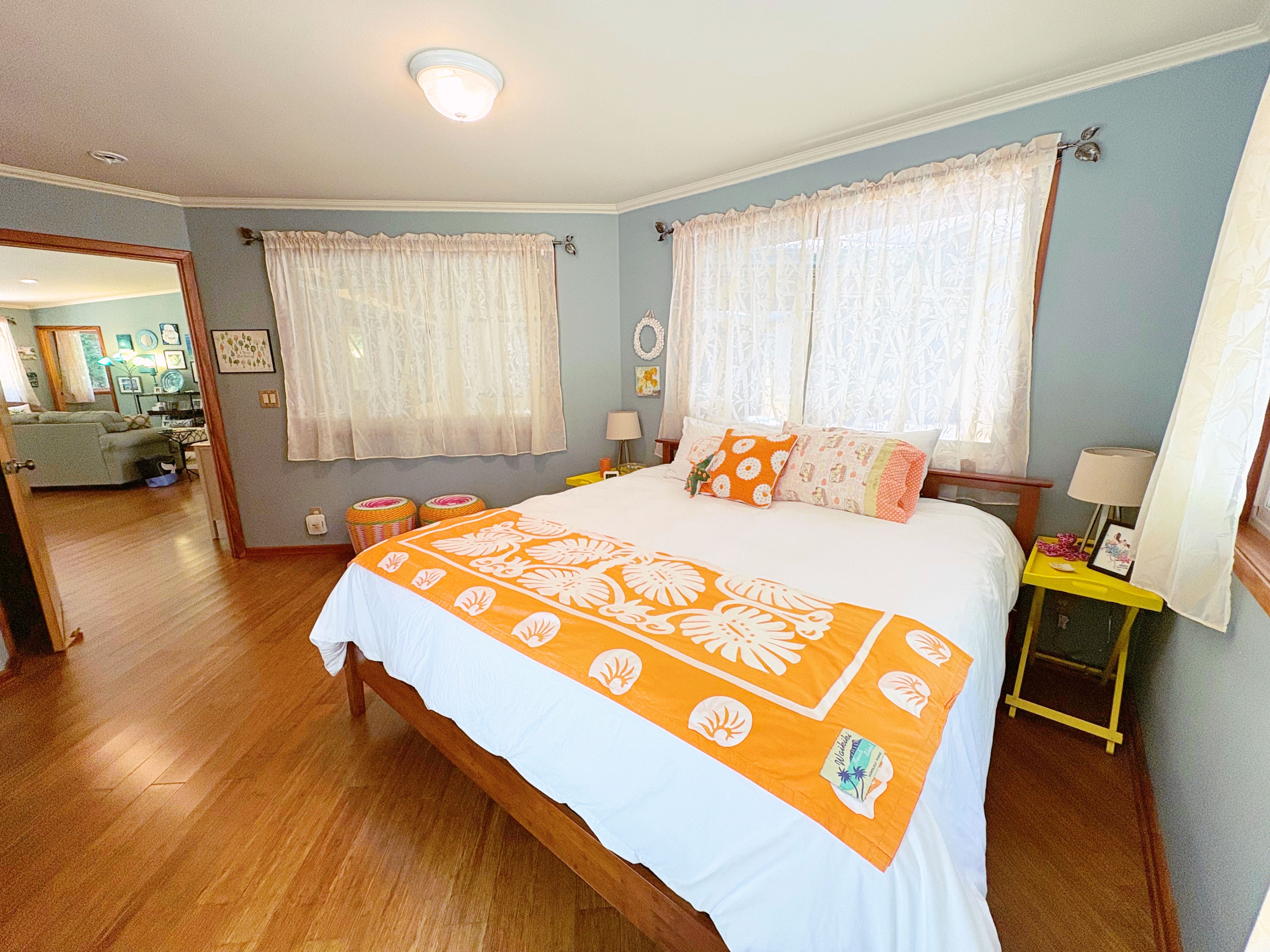 19-4218 Kawailehua Road Volcano, HI 96785 - Photo 13 of 30 a bedroom with a bed and wooden floor