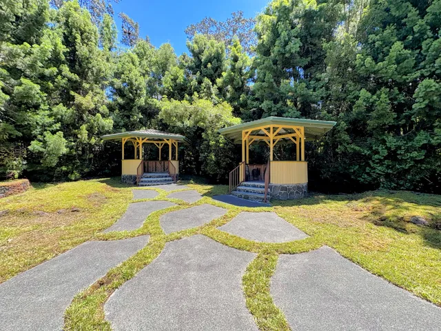 a front view of a house with swimming pool