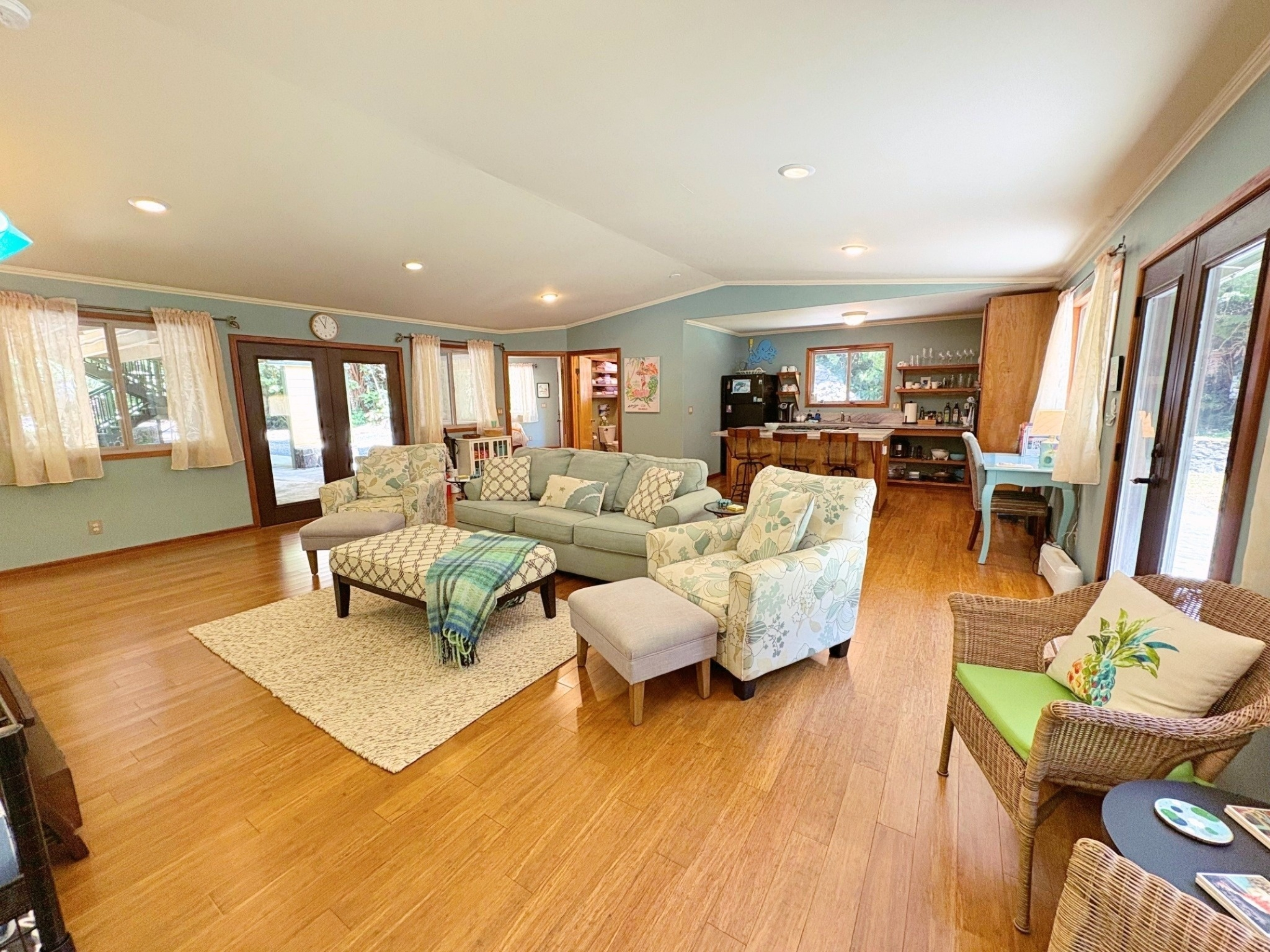 19-4218 Kawailehua Road Volcano, HI 96785 - Photo 8 of 30 a living room with furniture and a wooden floor