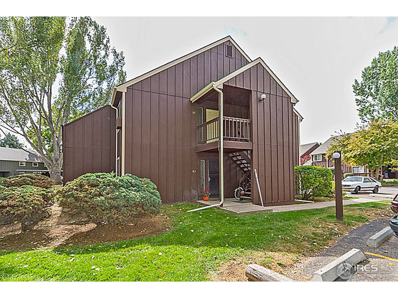 801 East Drake Road, Unit 83 Fort Collins, CO 80525 - Photo 19 of 21 a view of backyard of house with wooden fence