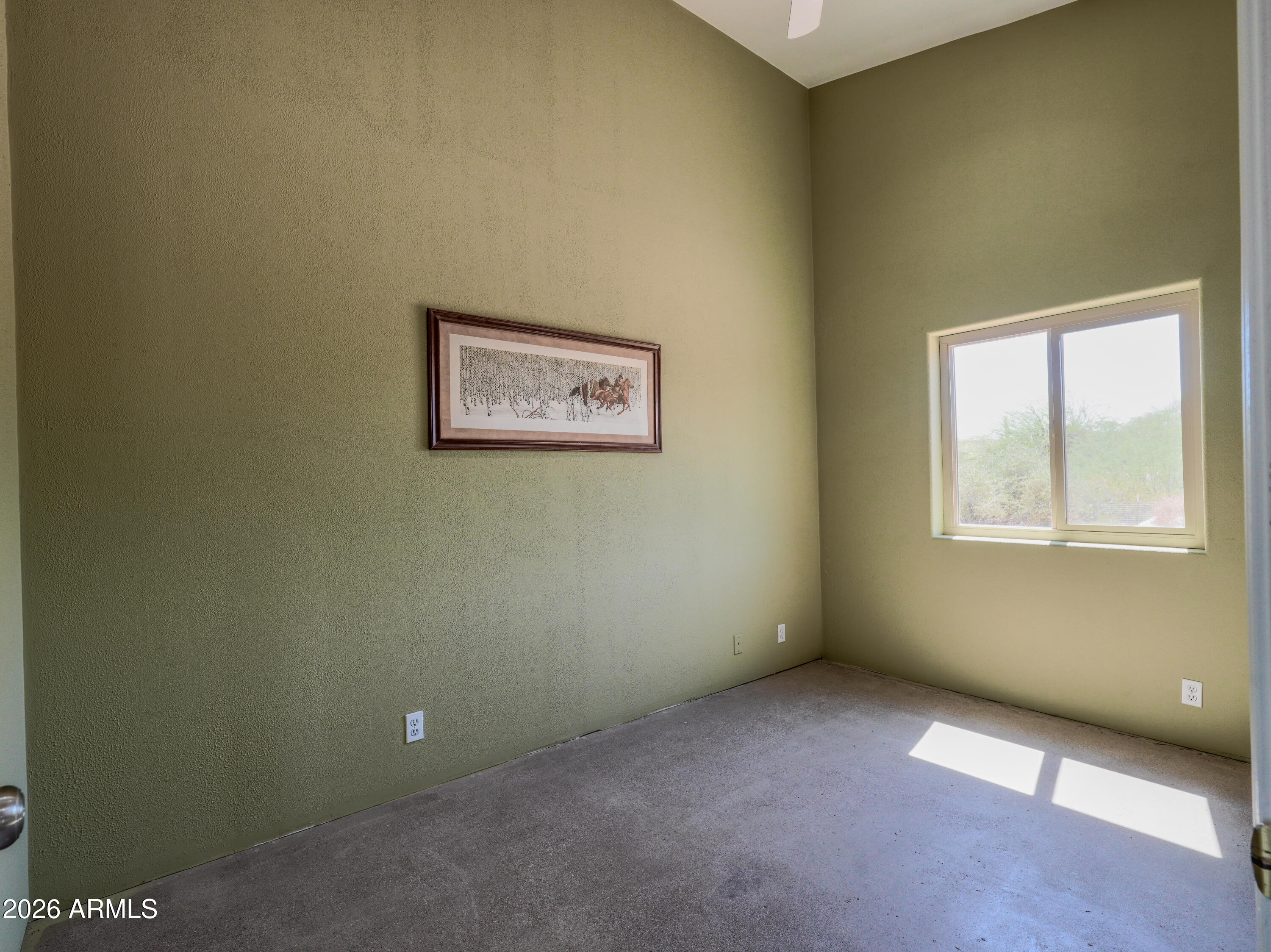 1224 North Acacia Road Apache Junction, AZ 85119 - Photo 33 of 48 an empty room with windows