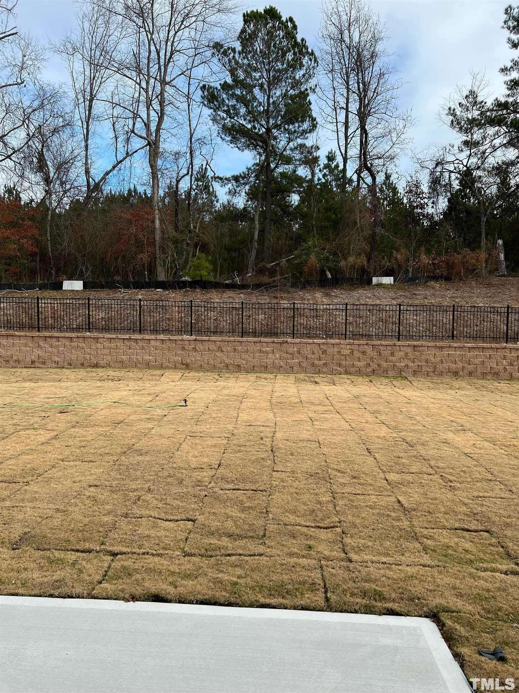 1632 Arapahoe Ridge Drive Raleigh, NC 27604 - Photo 25 of 28 a view of swimming pool with an outdoor space