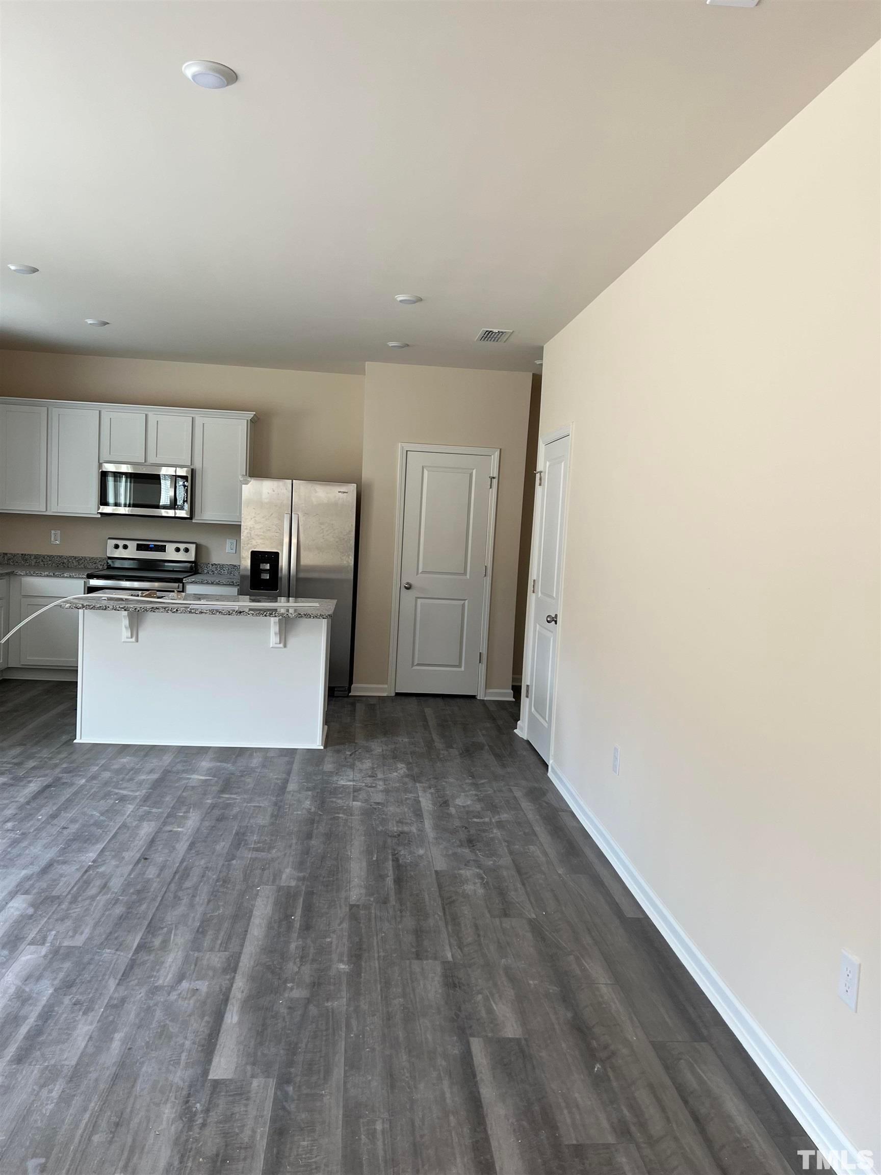 1632 Arapahoe Ridge Drive Raleigh, NC 27604 - Photo 5 of 28 a view of a kitchen with a sink and dishwasher