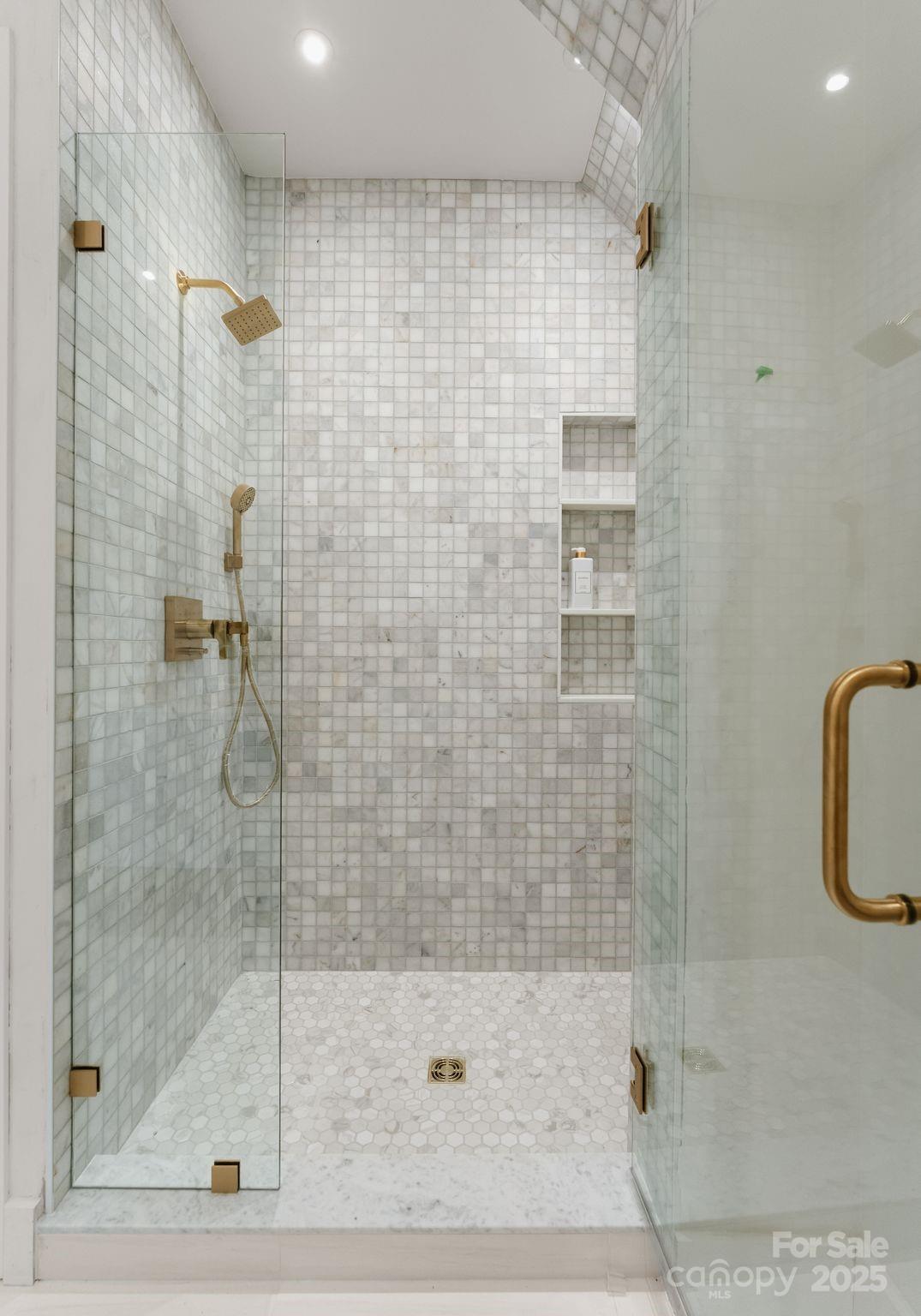 421 Marsh Road, Unit 102 Charlotte, NC 28209 - Photo 16 of 23 a bathroom with a shower