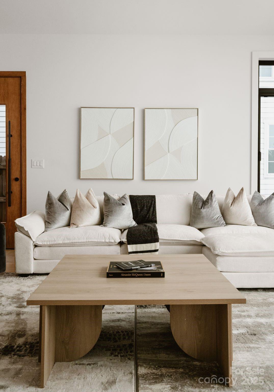421 Marsh Road, Unit 102 Charlotte, NC 28209 - Photo 9 of 23 a living room with furniture and a couch