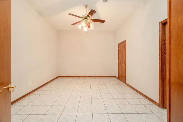 a view of a room with a large window