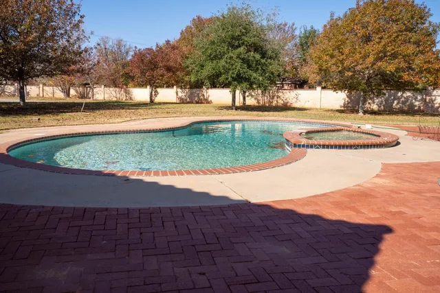 a view of a yard with an outdoor space