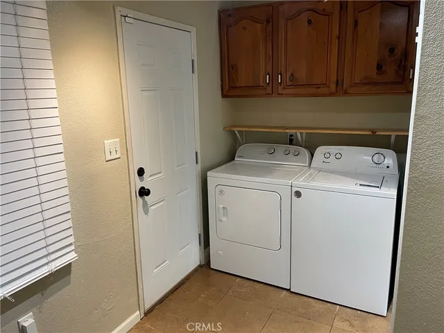 a view of a storage room with washer and dryer