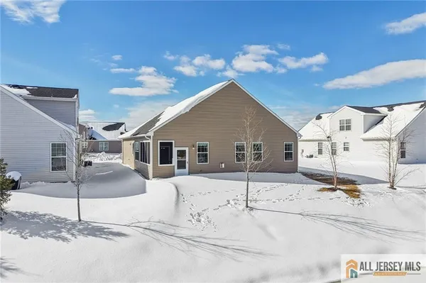 a view of a house with snow