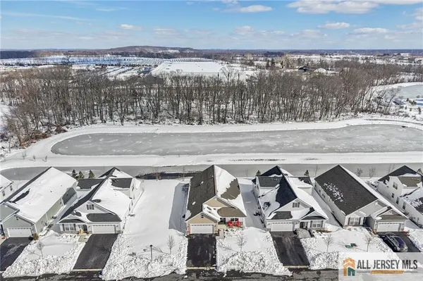 a view of swimming pool with outdoor seating and yard