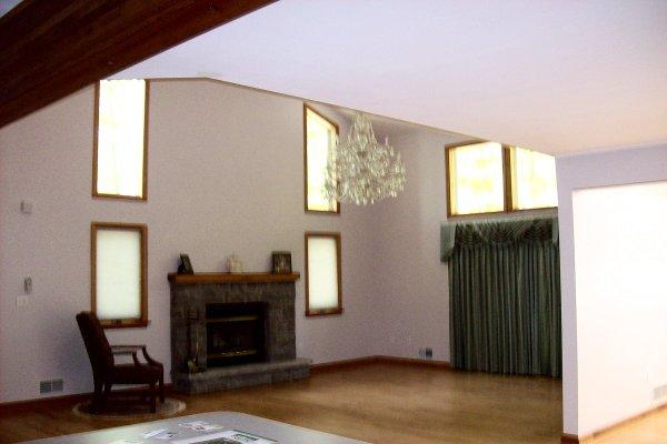 2755 Dundee Road Bushkill, PA 18324 - Photo 4 of 13 Living Room Fireplace and Hardwood Floor