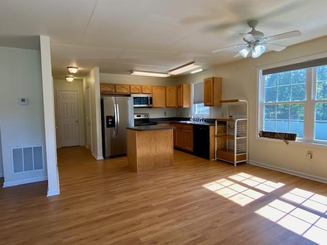 85 Fairview Road Louisa, VA 23093 - Photo 17 of 42 a view of kitchen with cabinets and wooden floor
