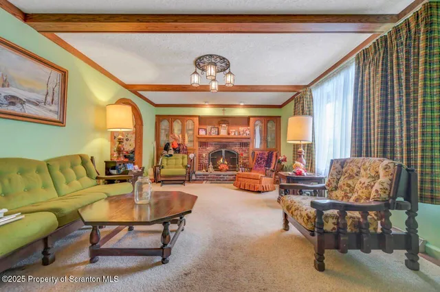 a kitchen with stainless steel appliances a stove a sink dishwasher and cabinets with wooden floor