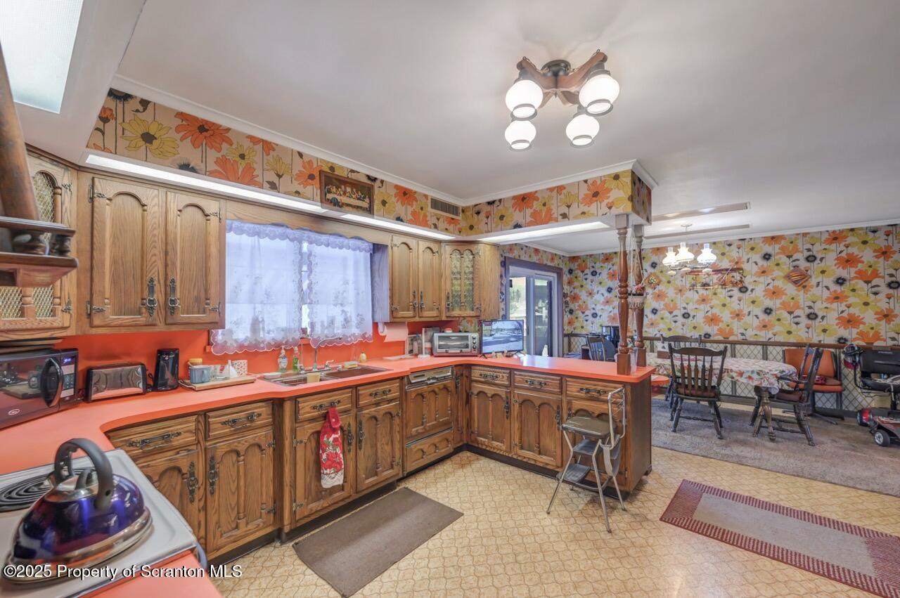 828 Glenwood Road Old Forge, PA 18518 - Photo 25 of 97 a kitchen with lots of counter top space