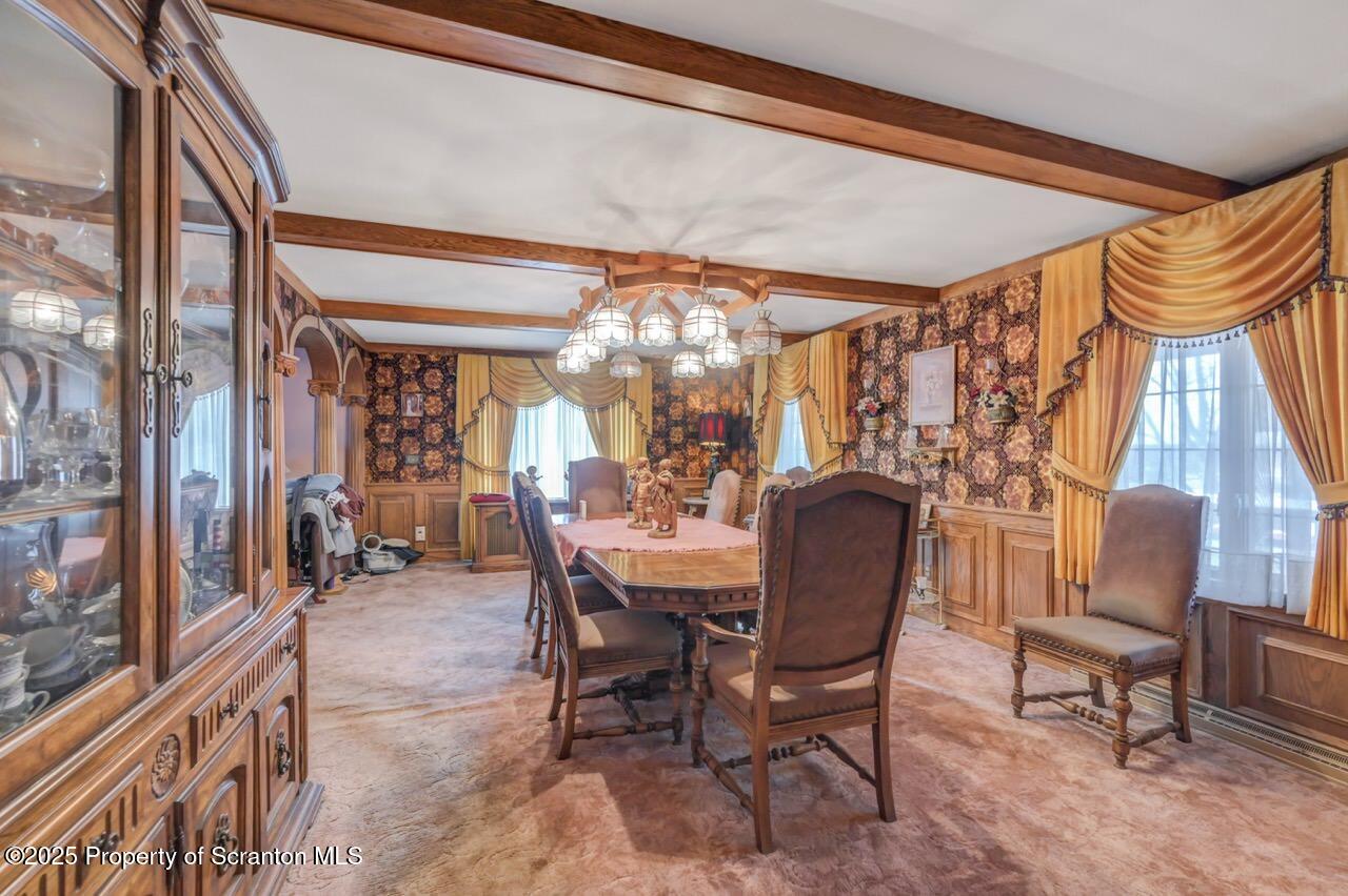 828 Glenwood Road Old Forge, PA 18518 - Photo 26 of 97 a dining room with furniture and window