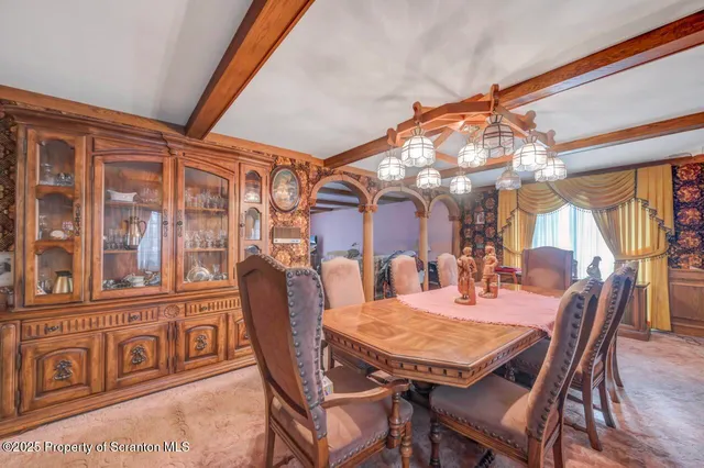 a spacious bedroom with a bed window and couch