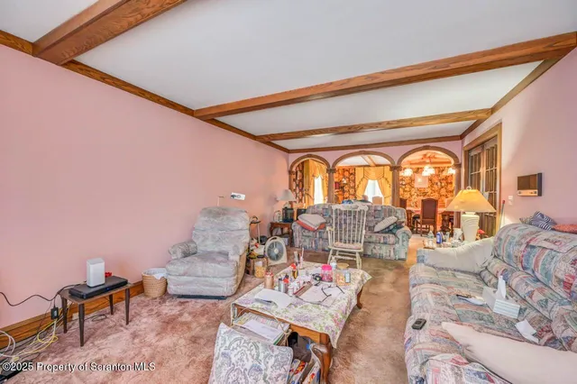 a bedroom with a bed closet and a window