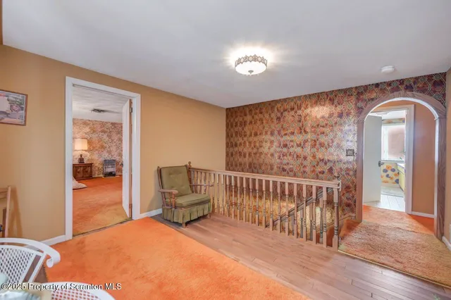 a view of a hallway with front door