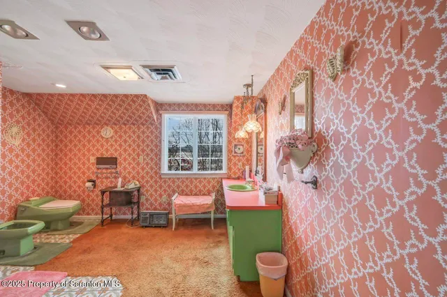 a view of a room with furniture