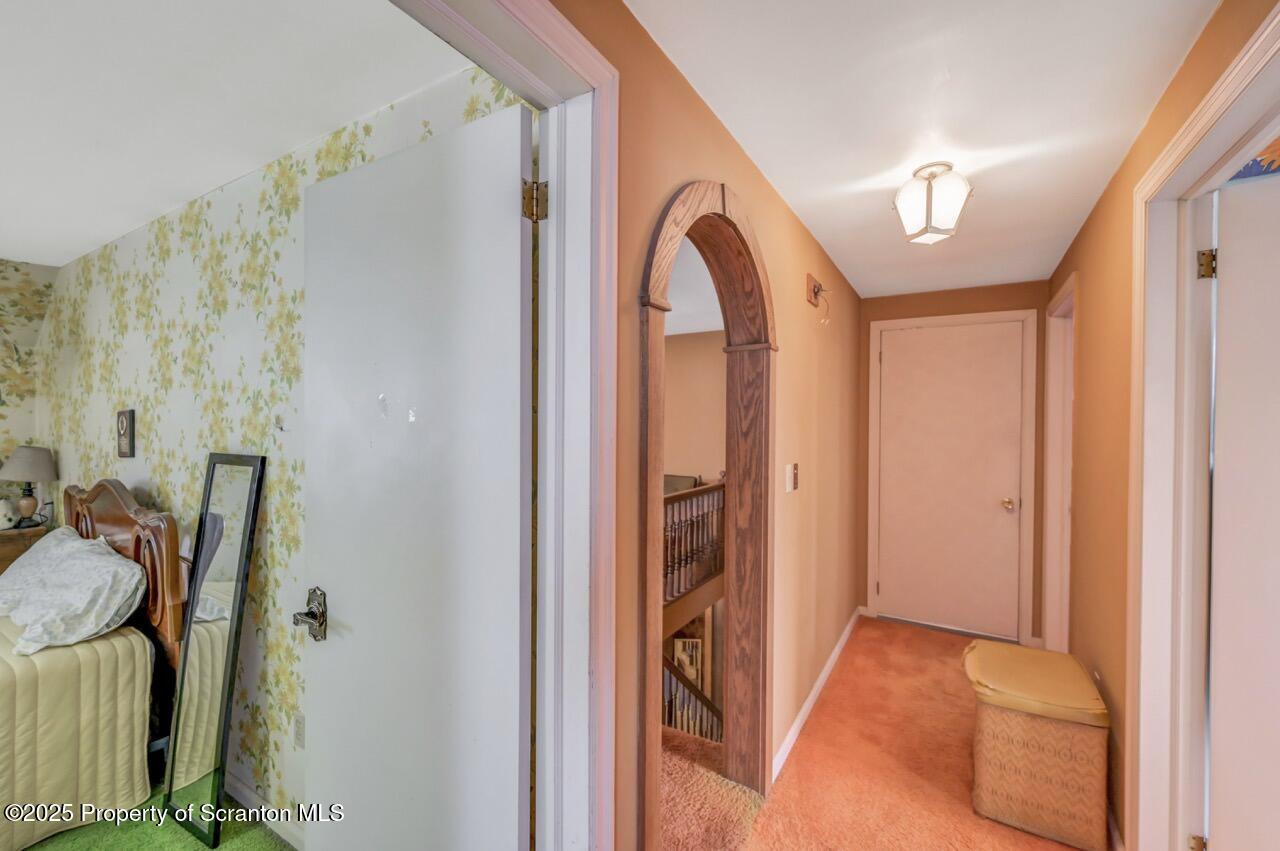 828 Glenwood Road Old Forge, PA 18518 - Photo 61 of 97 a view of walk in closet with clothes and shoes