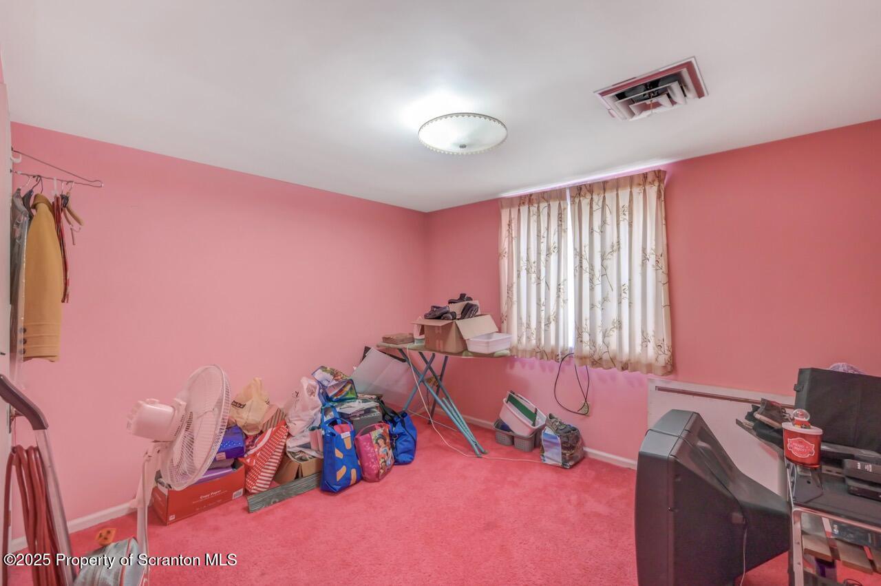 828 Glenwood Road Old Forge, PA 18518 - Photo 62 of 97 a view of a room with gym equipment