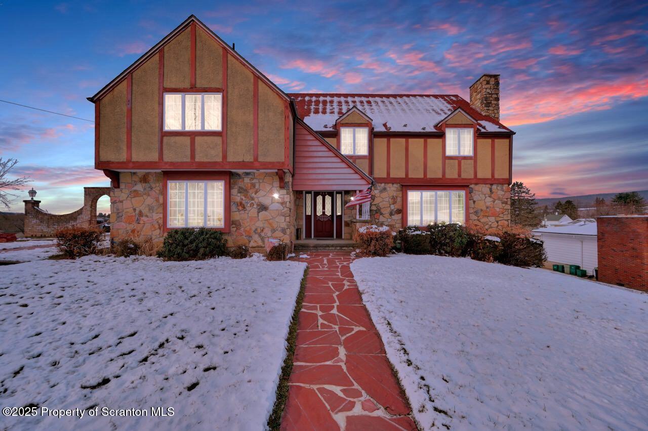 828 Glenwood Road Old Forge, PA 18518 - Photo 7 of 97 a front view of a house