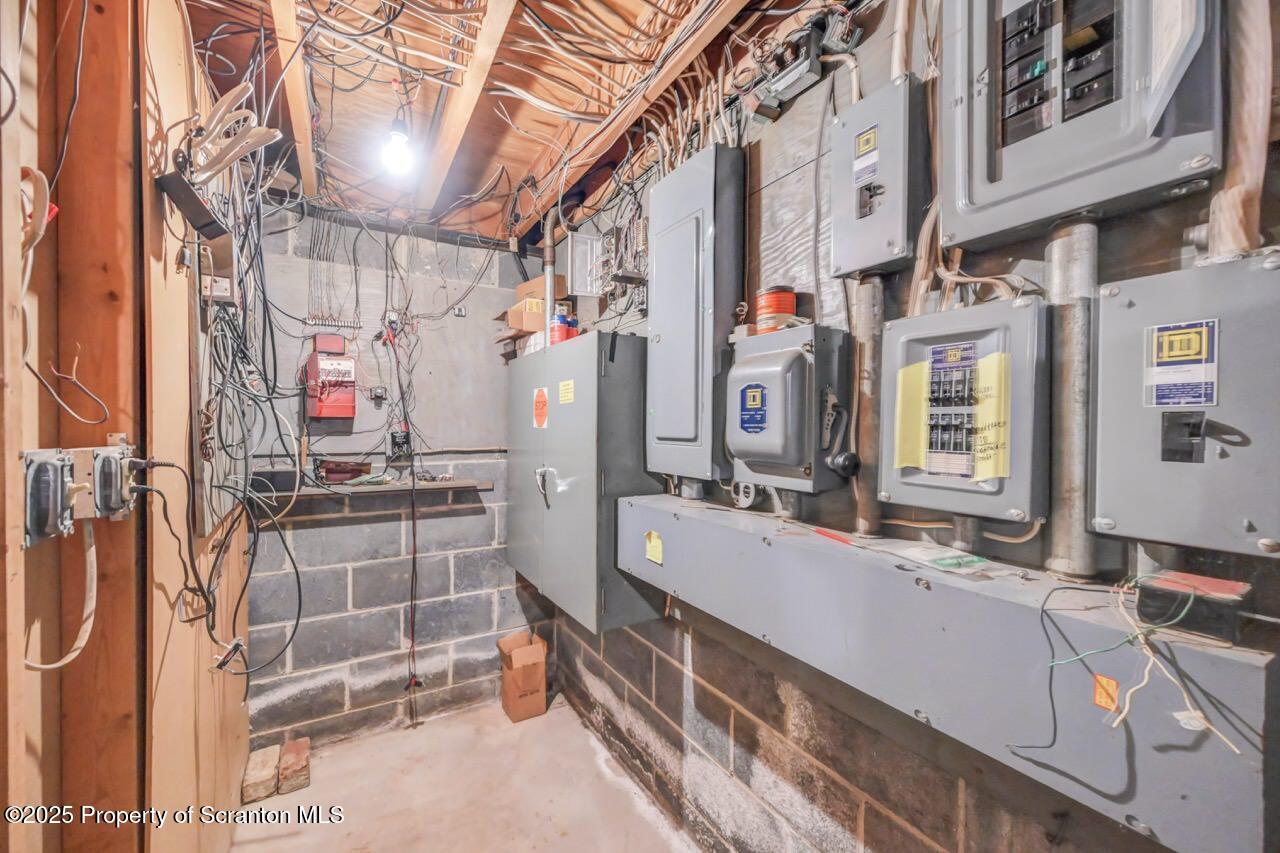 828 Glenwood Road Old Forge, PA 18518 - Photo 79 of 97 a bathroom with double vanity and a bathtub