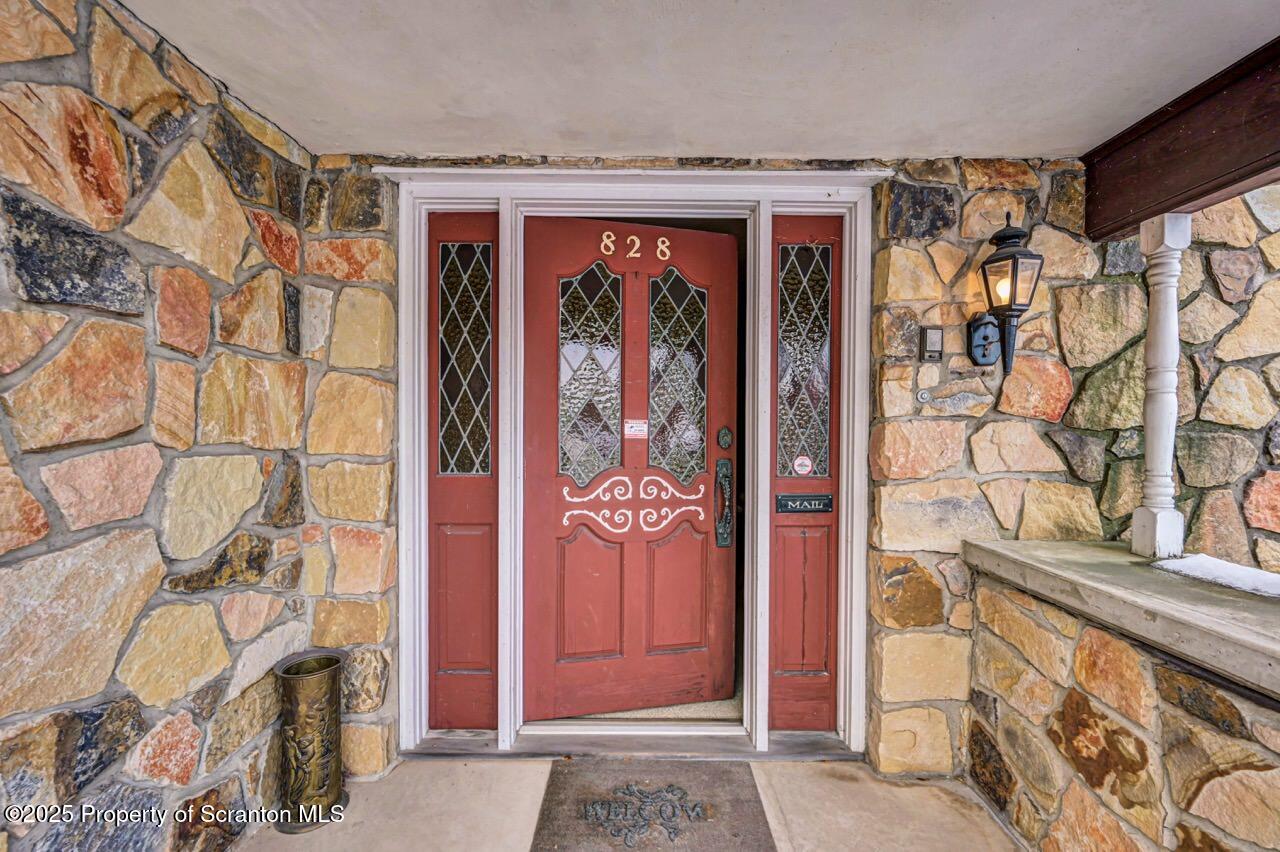 828 Glenwood Road Old Forge, PA 18518 - Photo 8 of 97 a view of front door with outside view
