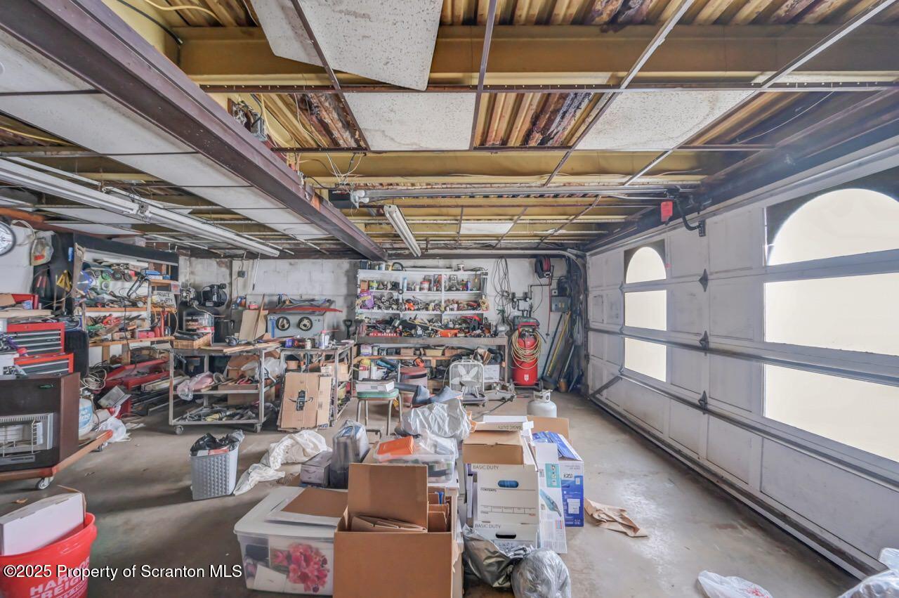 828 Glenwood Road Old Forge, PA 18518 - Photo 82 of 97 a view of store room with racks