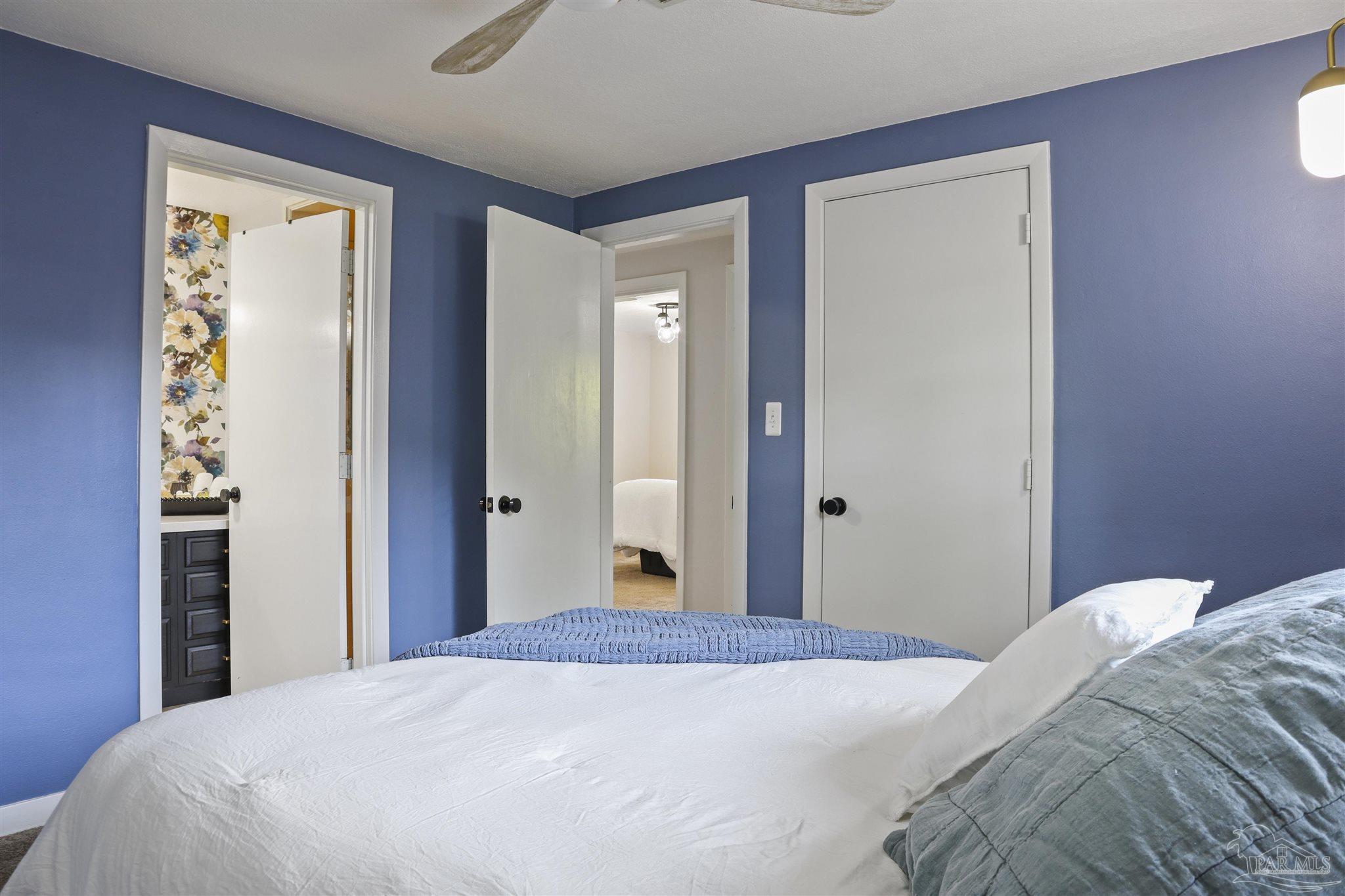 5925 Prince Road Pensacola, FL 32503 - Photo 18 of 51 a bedroom with a bed and a mirror