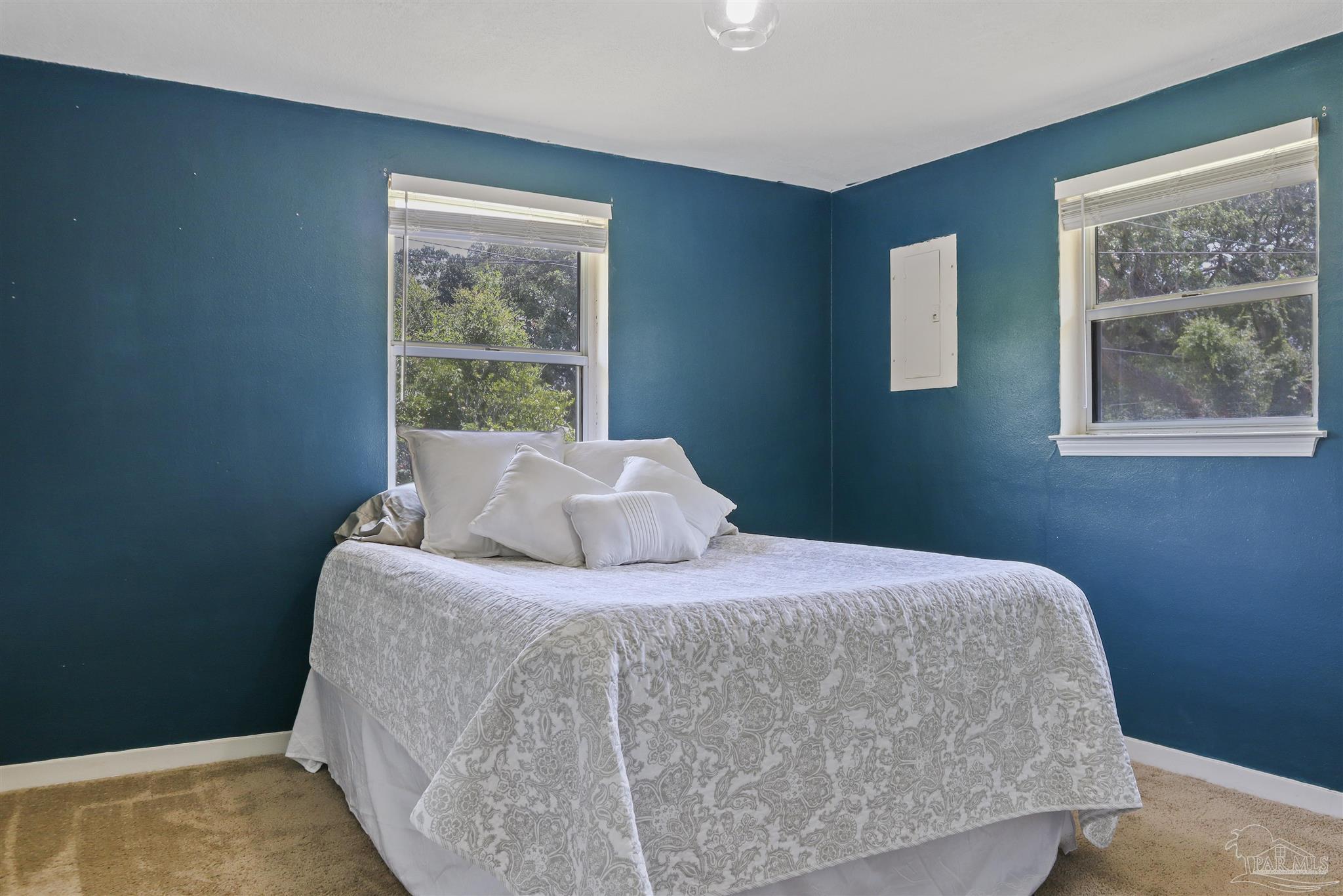 5925 Prince Road Pensacola, FL 32503 - Photo 22 of 51 a bedroom with a bed and window