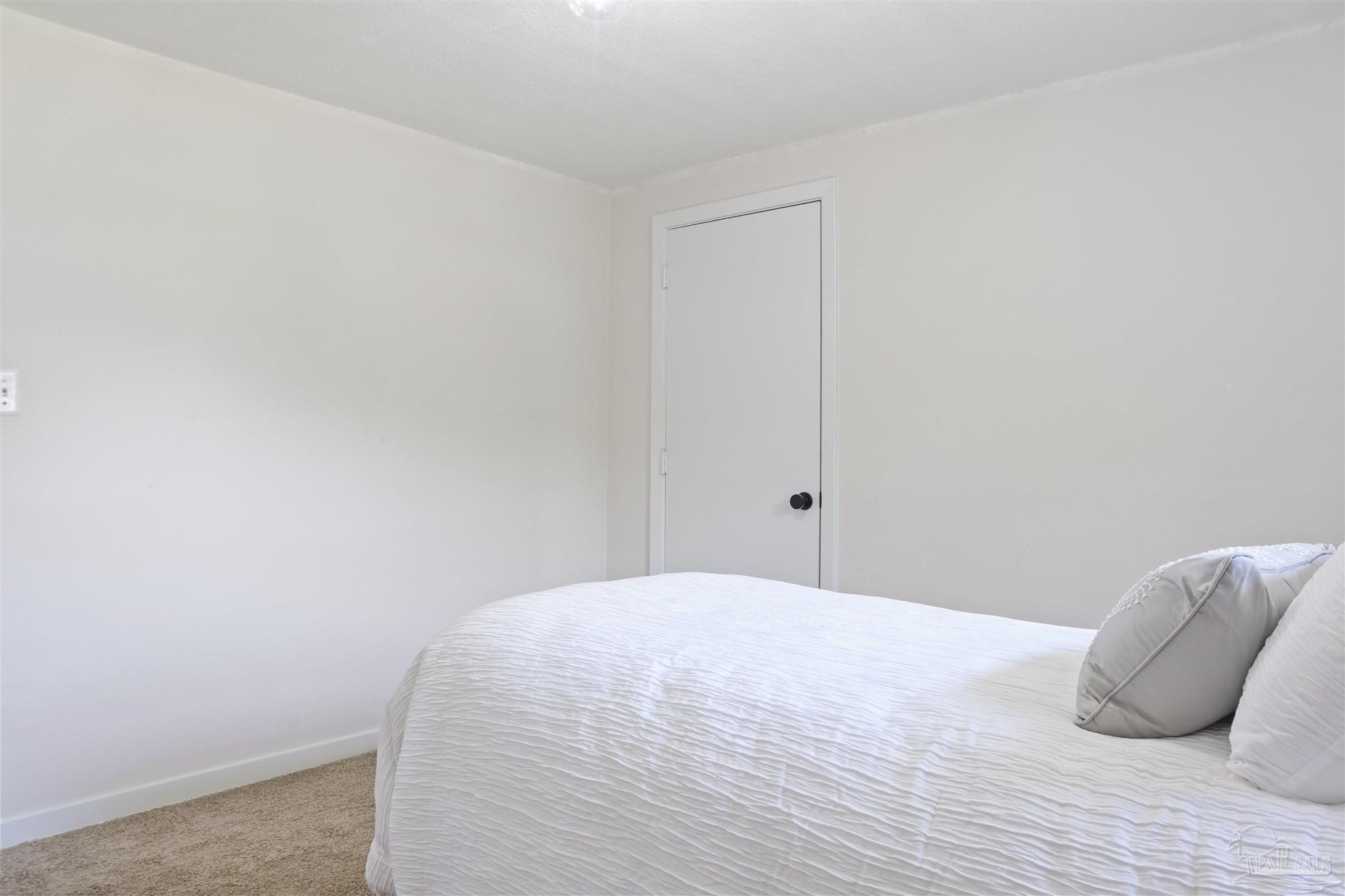 5925 Prince Road Pensacola, FL 32503 - Photo 26 of 51 a bedroom with a bed