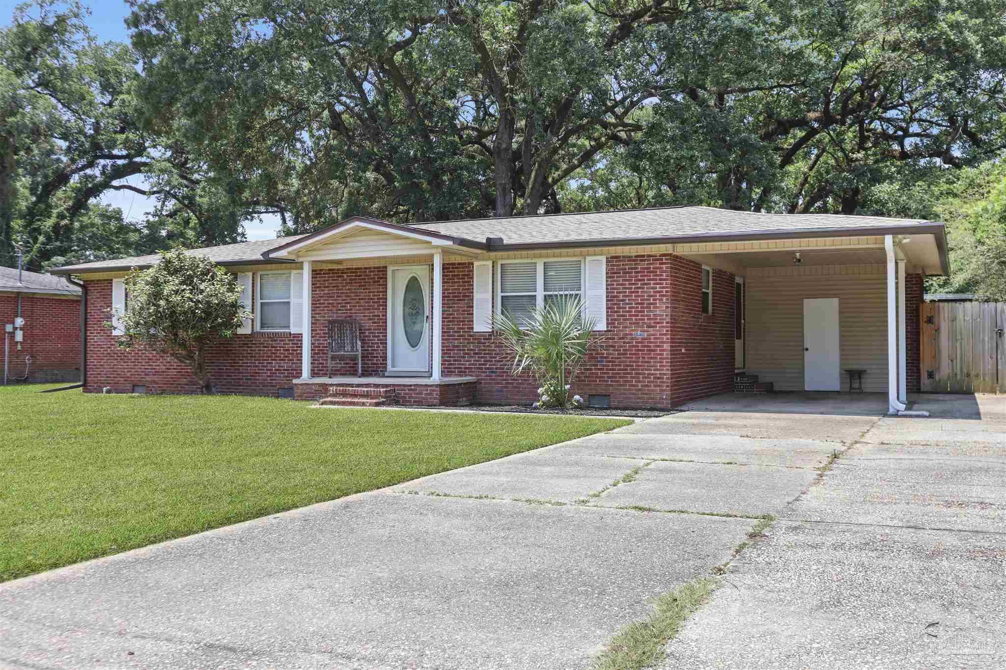 5925 Prince Road Pensacola, FL 32503 - Photo 42 of 51 front view of a house with a yard