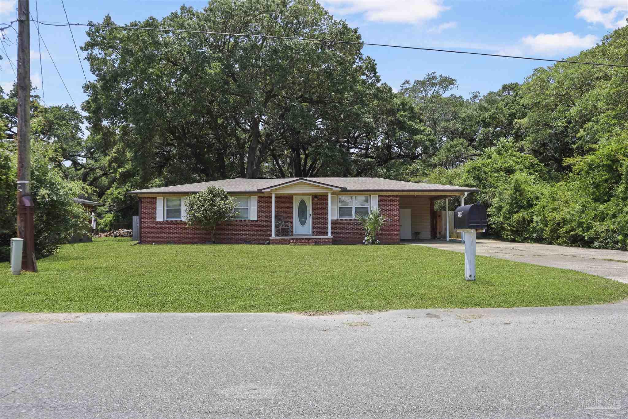 5925 Prince Road Pensacola, FL 32503 - Photo 47 of 51 a house view with a garden space